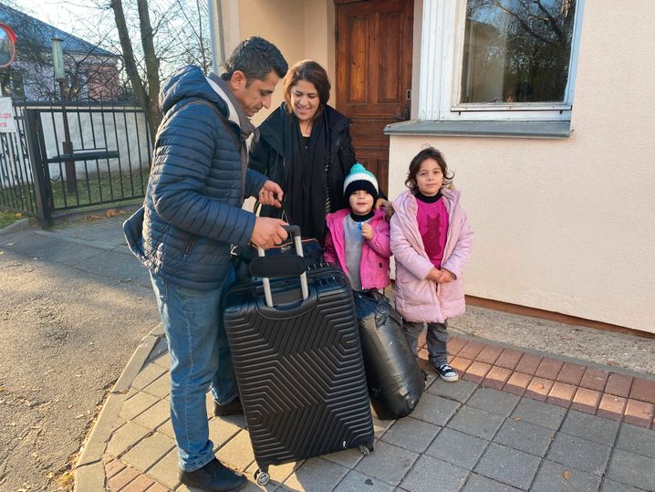 Shimal with his family in Minsk