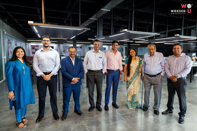 Ratna Rakhi Pula (CF & AO, Woxsen University), Dr. Raul V Rodriguez (Vice-President, Woxsen University), Dr. Krishna Chalam (Vice-Chancellor, Woxsen University), Vishal Khurma (CEO-Woxsen University), Sridhar Gadhi (Founder & Exec. Chairman, Quantela), Revathy Ashok (Co-Founder, Strategy Garage), Dr. M. Rammohan Rao (Former Director, IIM Bangalore), Praveen K. Pula (Chancellor-Woxsen University) in AI & Robotics lab at Woxsen Univeristy.