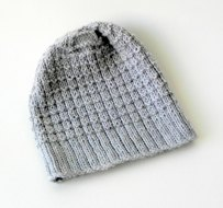 waffle knit hat on white background