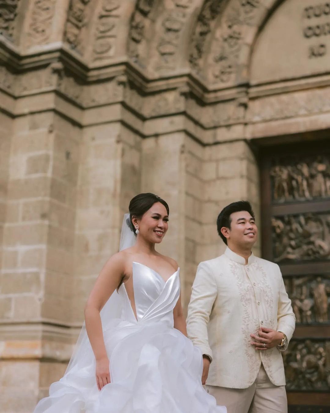 Traditional Filipino wedding bride and groom attire.