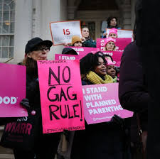 Protest against the gag rule, with a sign that reads "NO GAG RULE". 