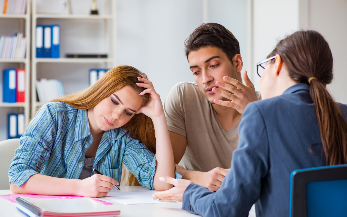 A group of people sitting at a tableDescription automatically generated