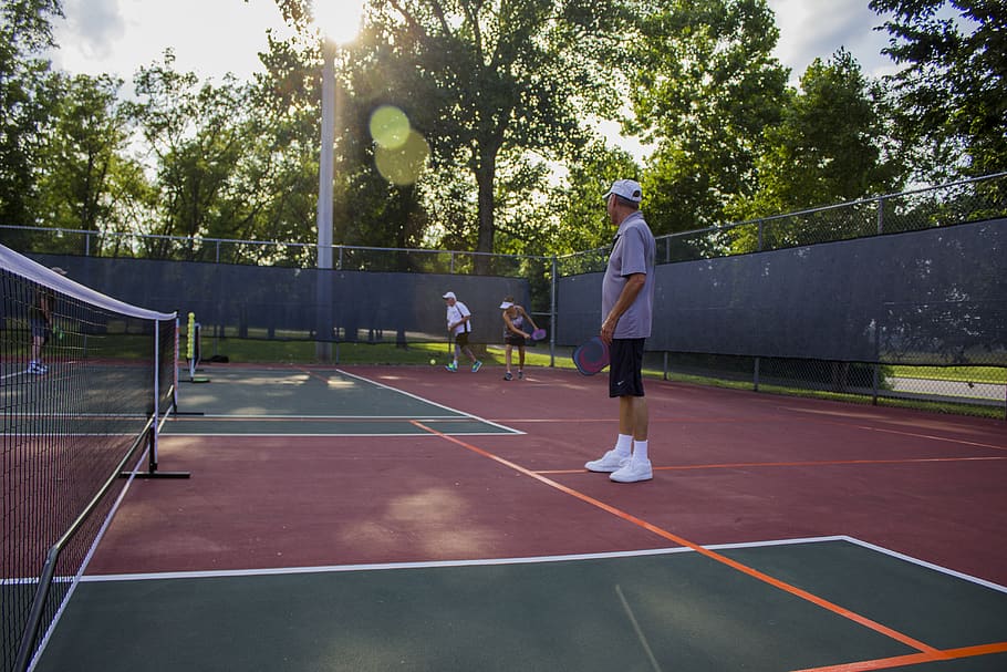 A group of pickleball players on the court