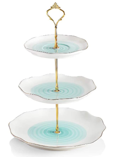 ceramic white and green cake stand