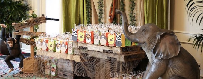 Elephant next to giveaways for safari themed birthday in kids birthday party in malaysia