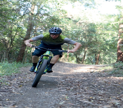 A mountain bike handlebar that has sweep won’t allow you to have an aggressive riding position like this but you will be more comfortable in the long run. 