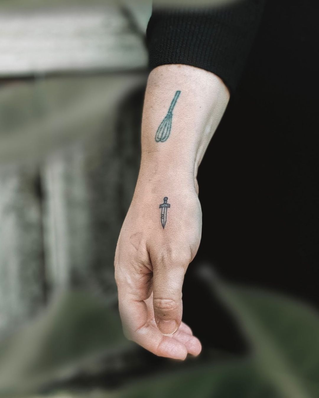 Small Whisk And Dagger Tattoo