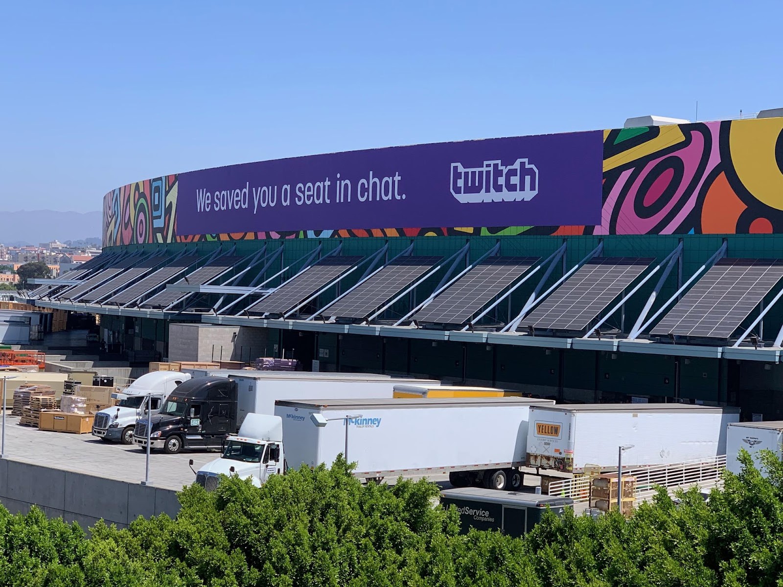 Twitch wrapping the stadium with its logo and the text "We saved you a seat in chat."