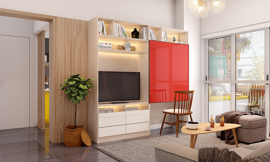 Tv unit cum space-saving computer desk separated by a partition and covered with a sliding door