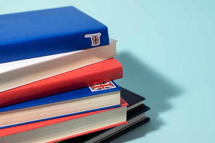 Stacks of English Books on a Study Table - Ideal for UKiset-Approved Preparatory Schools Guide