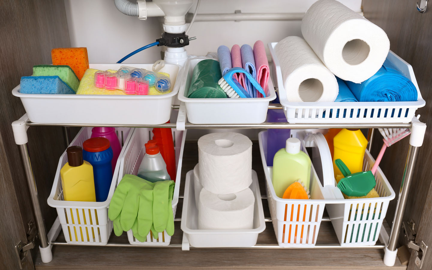 storing cleaning supplies under the sink