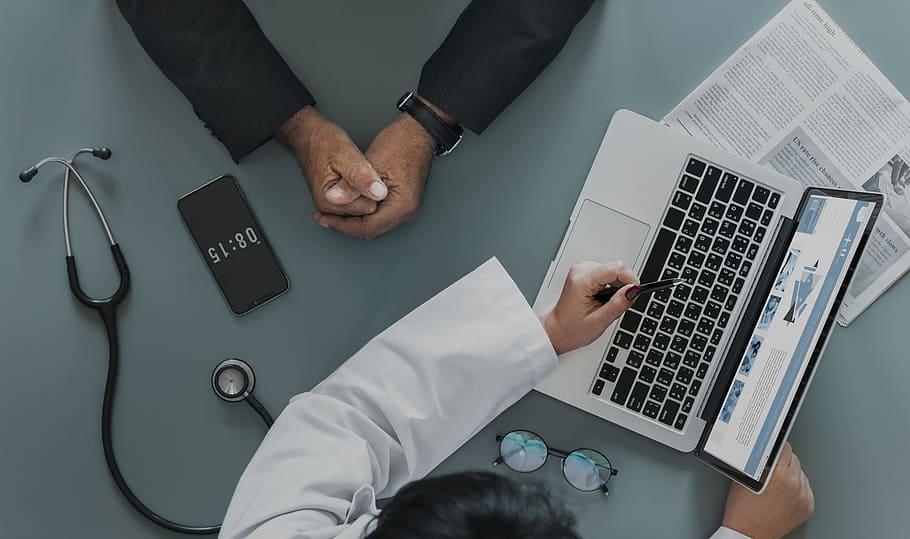 Doctor Using a Laptop