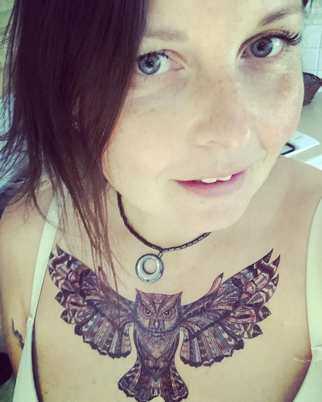 owl tattoos on chest