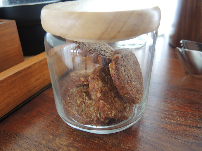 a jar of cookies on a table