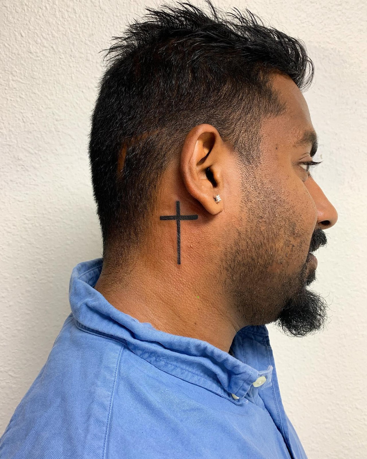 Cross Behind The Ear Tattoo