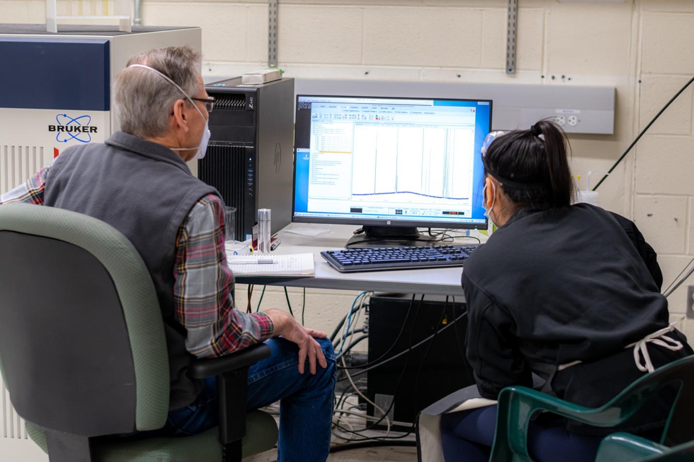 Chemistry students working on a computer