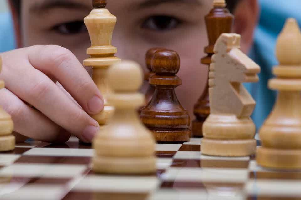 A child playing chess