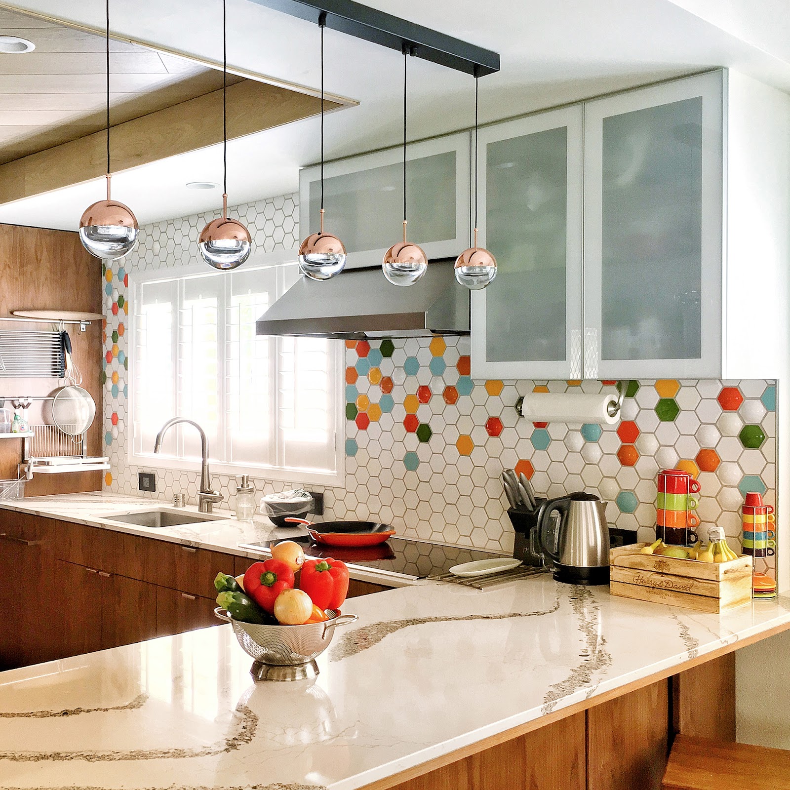 Kitchen with multi-color hex tile and modern accents
