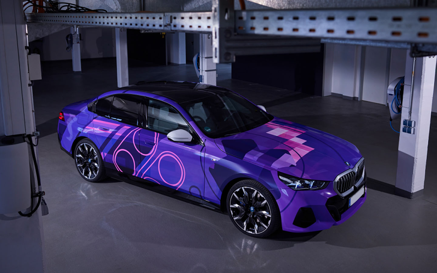 the bmw i5 reflects the colour scheme of the games available in the car