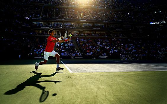 Novak Djokovich playing tennis in the US Open tournament, 2013, by Al Bello