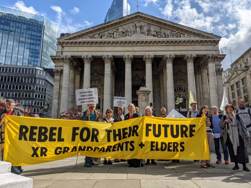 XR Grandparents & elders holding a banner "Rebel for their future"