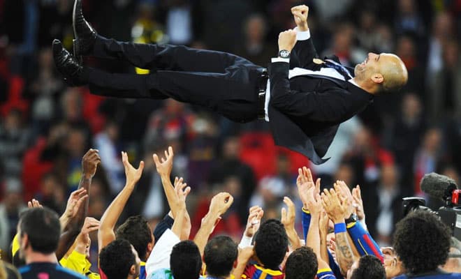Pep Guardiola, supported by his pupils after winning his second Champions League with FC Barcelona.