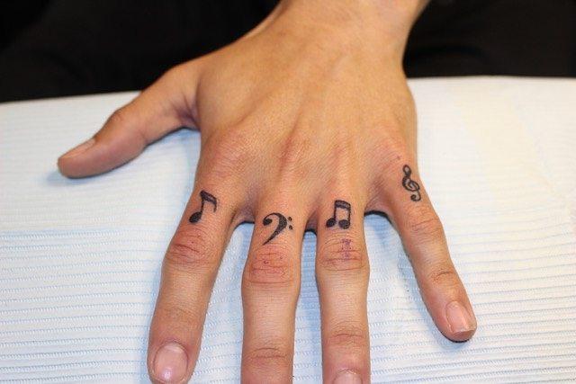 Music Tattoo Design Inspiration On Fingers