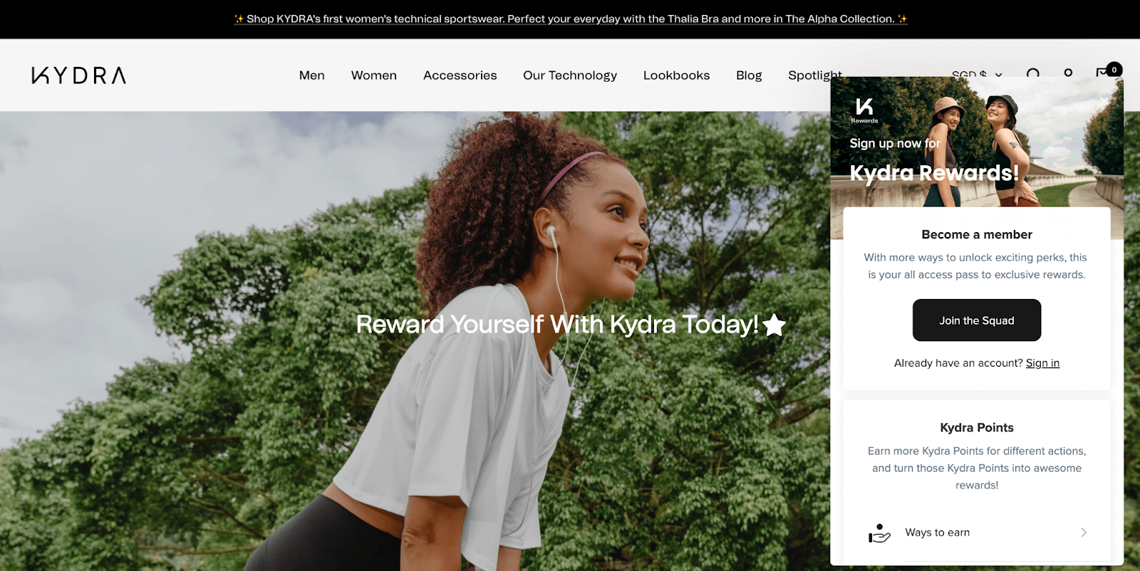 Fashion Industry Loyalty Program Examples–A screenshot from KYDRA Activewear’s rewards program explainer page. The image shows a Black woman wearing activewear while on a run outside. The text in front reads, “Reward Yourself With Kydra Today!” The rewards panel is visible on the right side of the screen. 