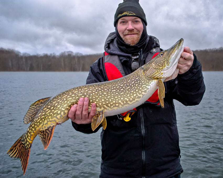 Sean Gleeson holding a Lake Ontario Northern Pike