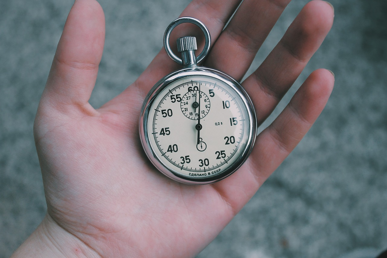 A stopwatch held in a hand