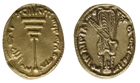 A close-up of a coin

Description automatically generated with low confidence