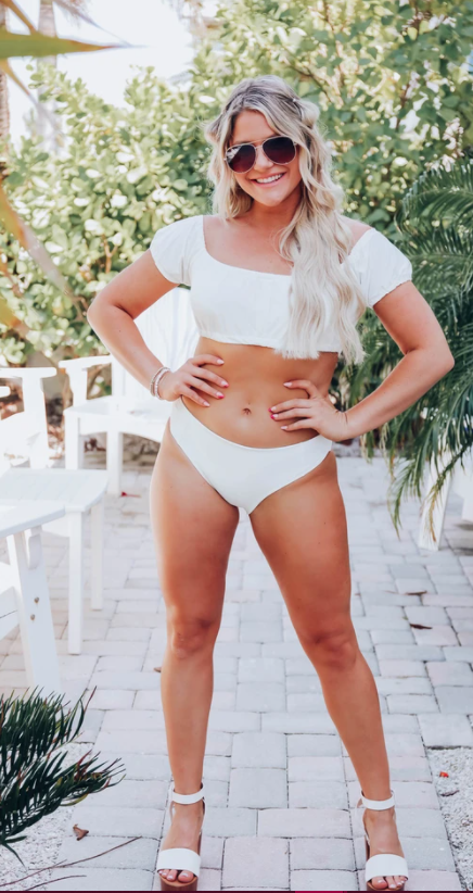 Photo of a white 2 piece bathing suit set from Whiskey Darling. 