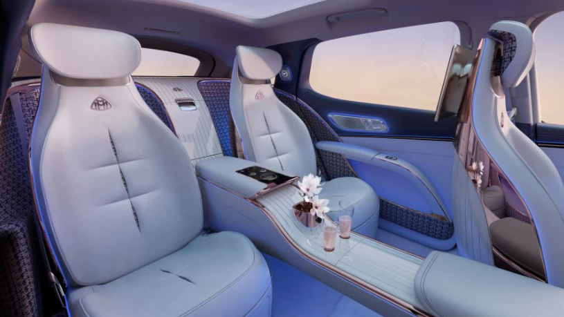 a virtual interior of a Mercedes concept car with white leather seats and calm lighting