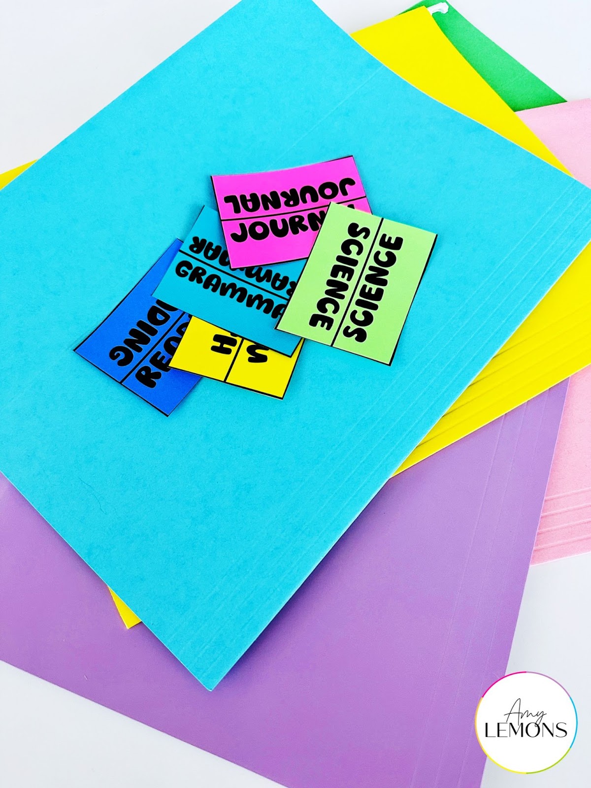 Colorful hanging file folders used to hold substitute plans.