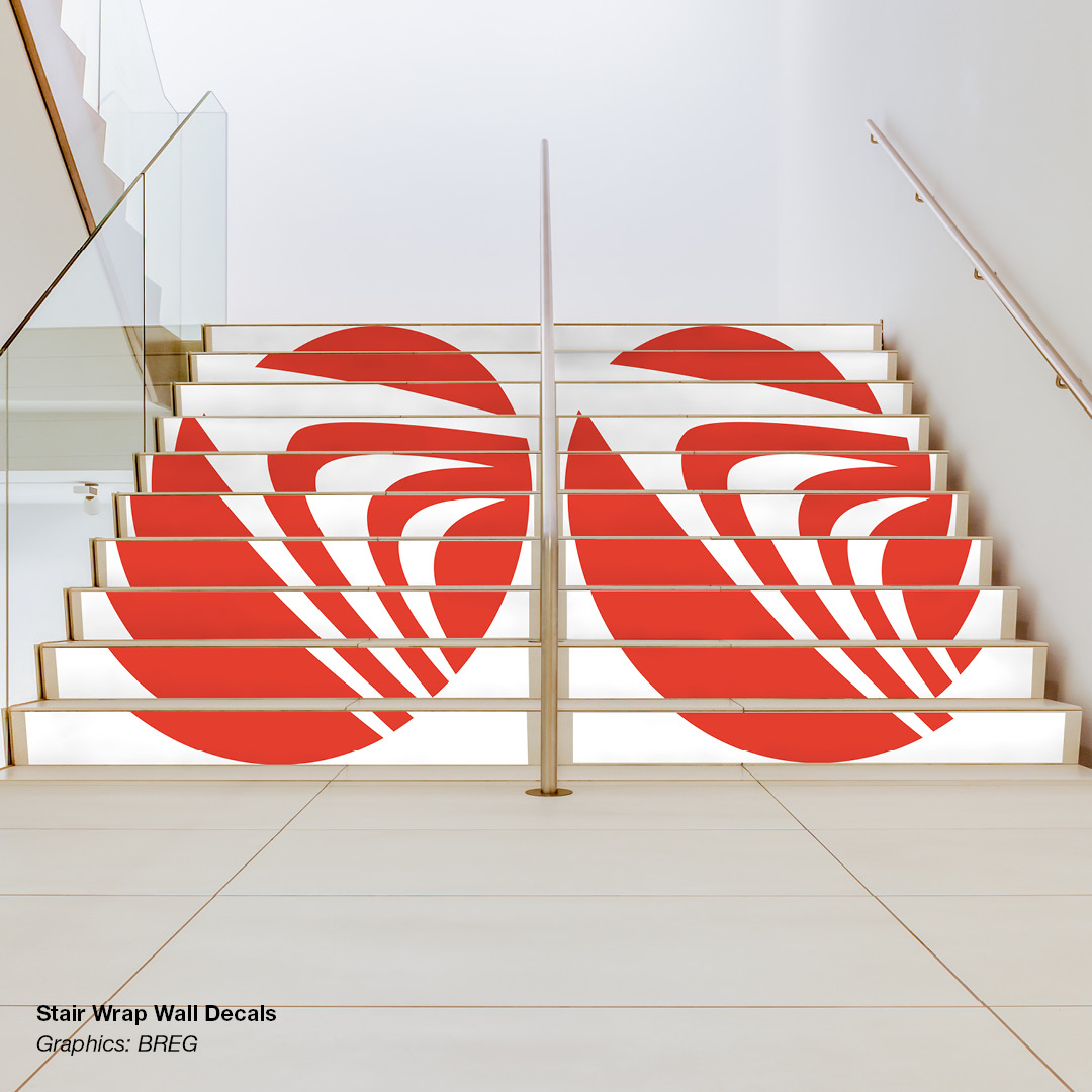 Decals placed along the risers of stairs that form the Breg logo when viewed from the front