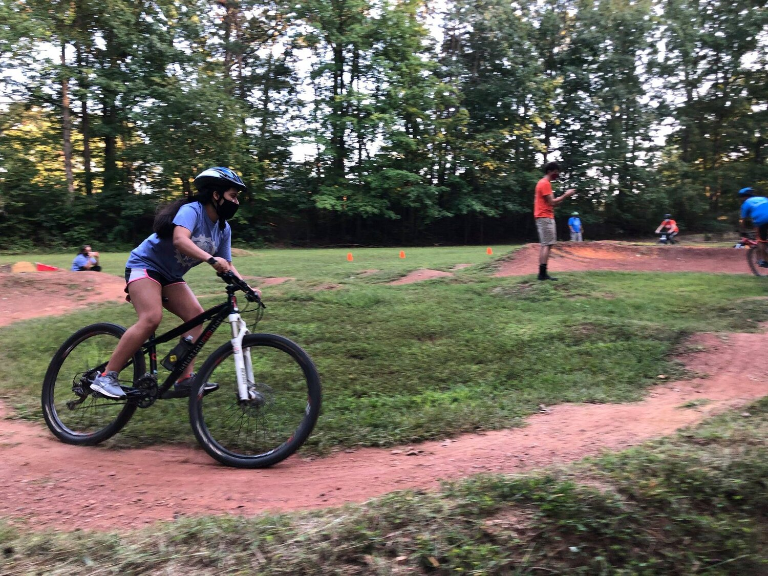 Young girl shows off some serious skill on a mountain bike