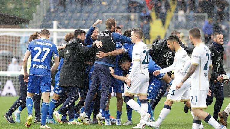 Empoli players celebrate their comeback win after being two goals behind till the 80th minute