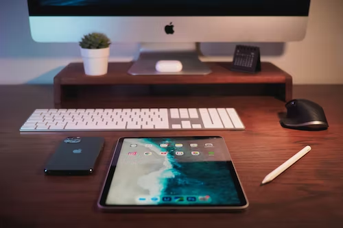 A tech enthusiast's executive desk will always feature the latest technology, such as monitors, tablets, wireless chargers, and other smart gadgets.
