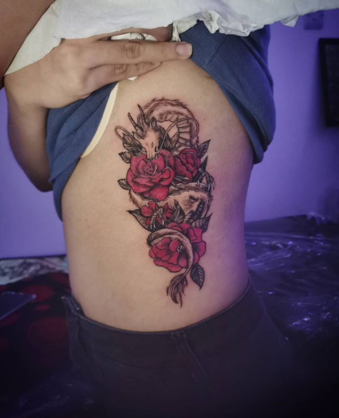 Flower Themed Rib Tattoos 61