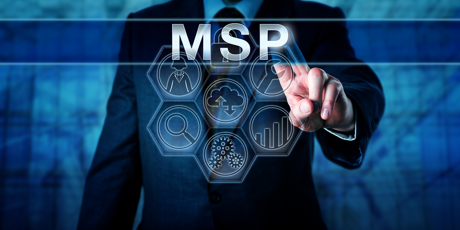 Businessman reaching forward and tapping a holographic screen with the letters “MSP,” surrounded by technology icons.  