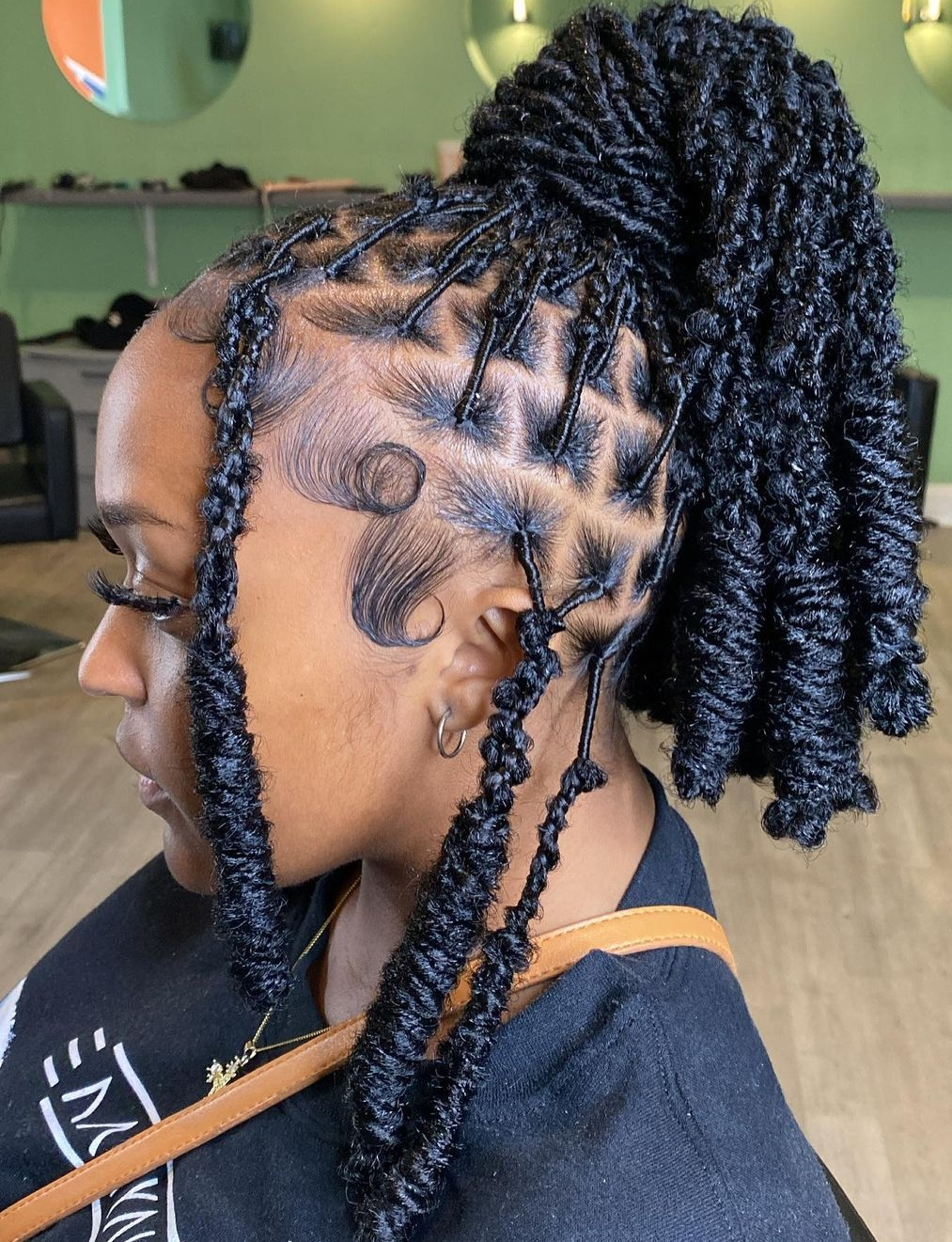 Picture showing her soft locs as a bun
