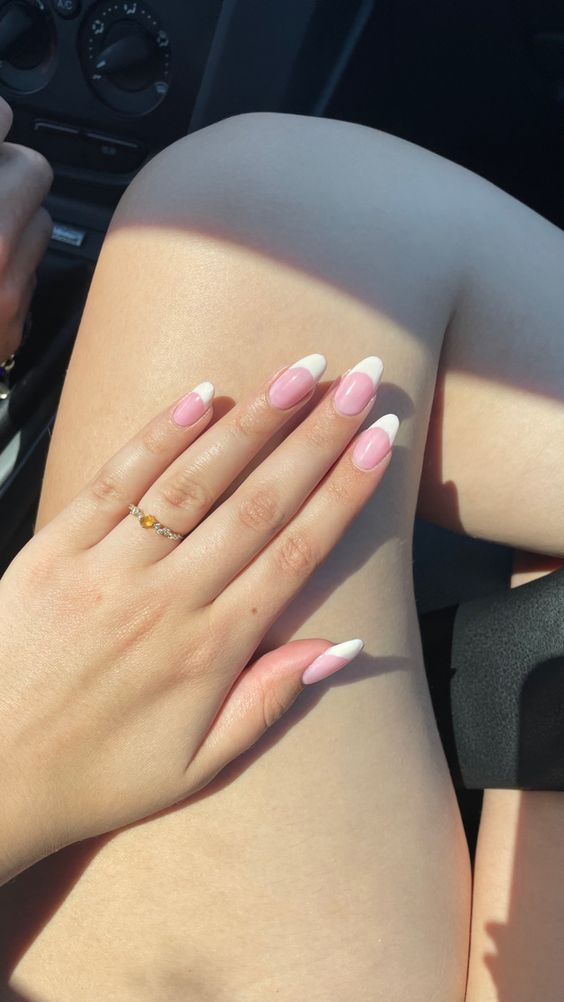 Lady shows off her  gorgeous pink and white nails 
