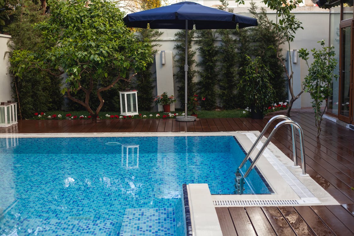 Swimming Pool Surrounded with Wooden Deck