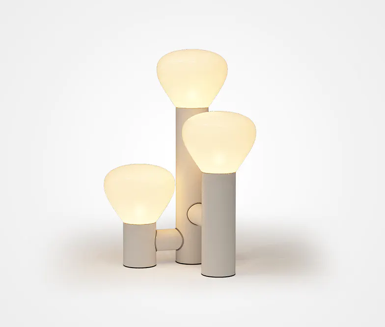 A Scandinavian table lamp with a frosted glass shade, made of iron, and equipped with an energy-saving LED bulb.