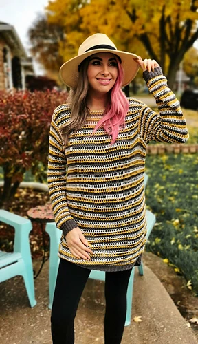 woman wearing a long sleeve striped crochet tunic