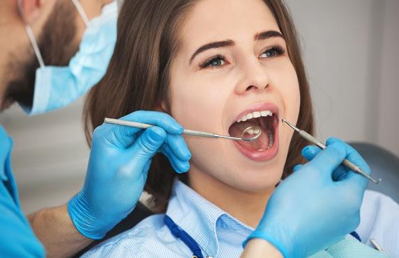Happy patient receiving orthodontic treatment 