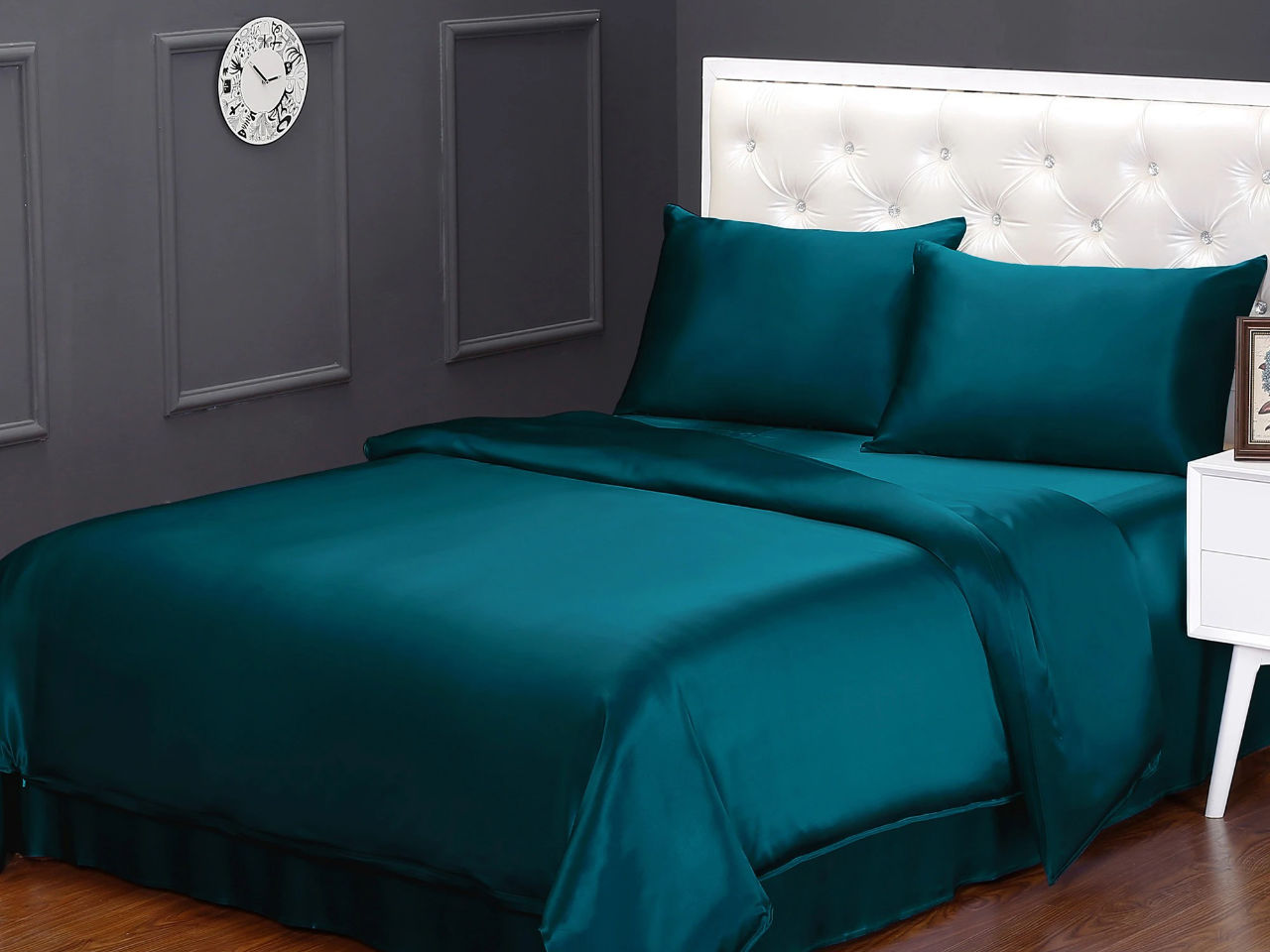 Bed with teal silk sheets