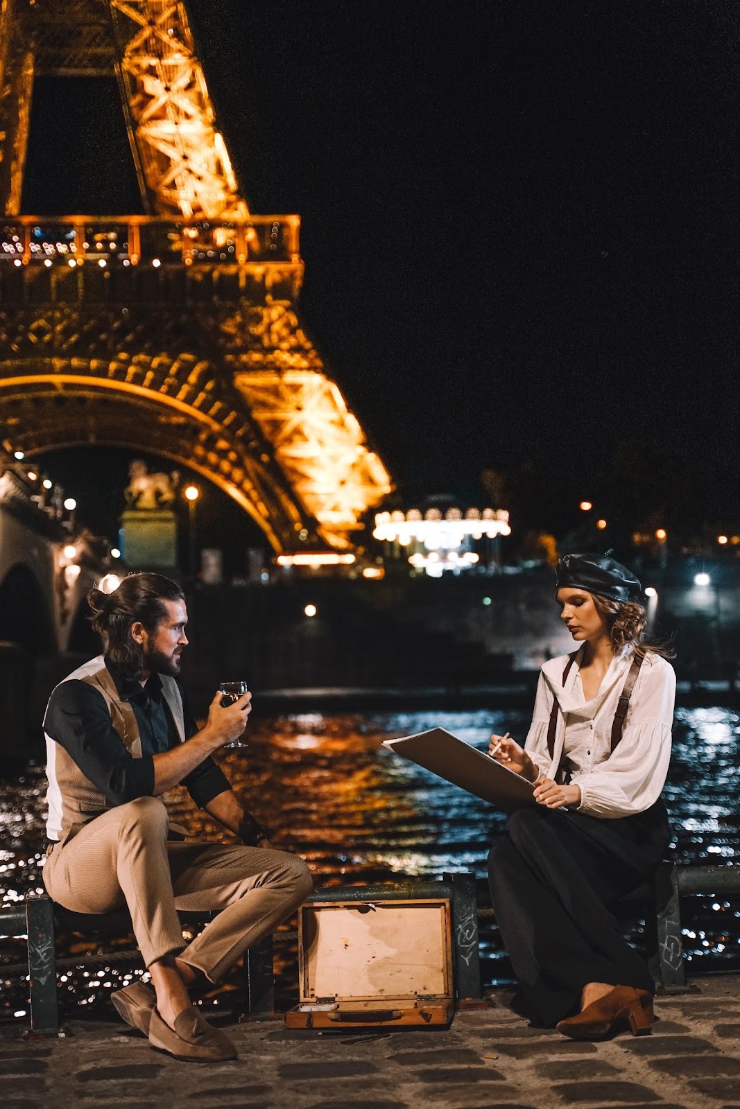 A great place to sit in the shadow of the Eiffel tower, enjoying each other's company. 