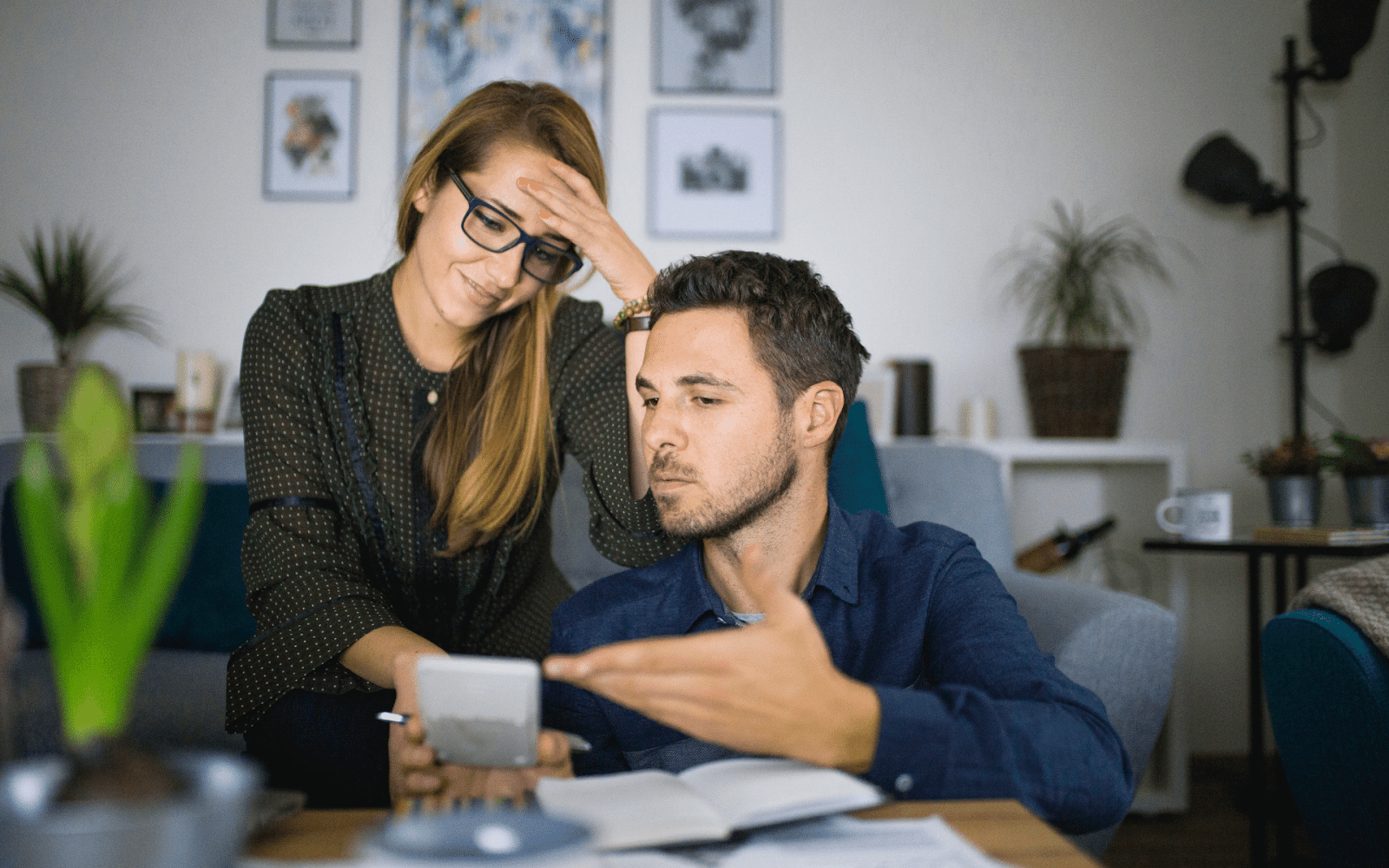 Two people looking at a phone

Description automatically generated with low confidence