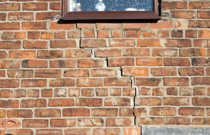 Diagonal Cracks in Masonry Wall Close to a Window